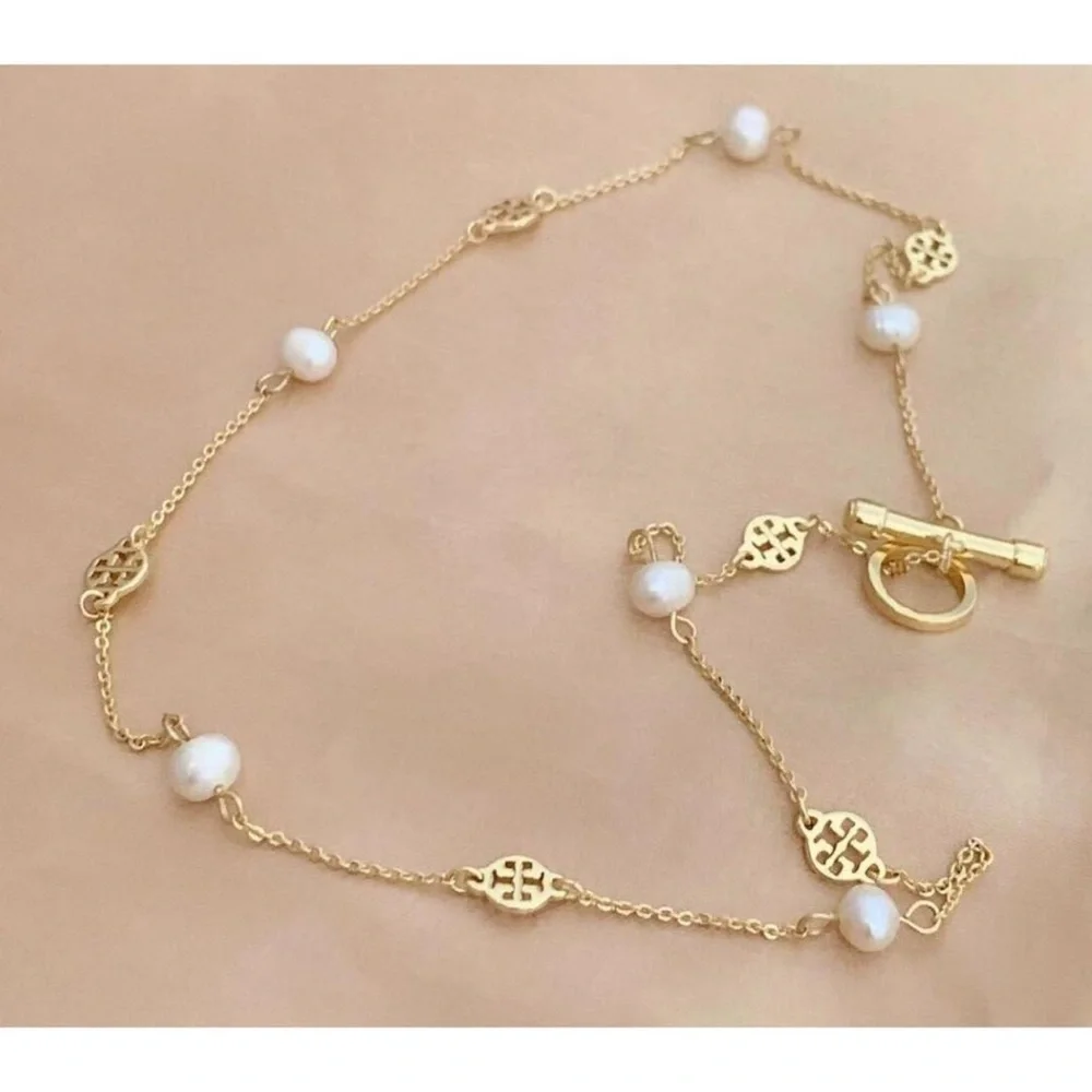 Tory Burch Gold and White Necklace with Textured Discs - Picture 2 of 4